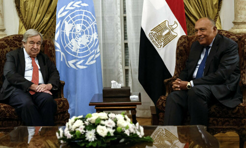 At the gates of Gaza, aid piles up in Egypt