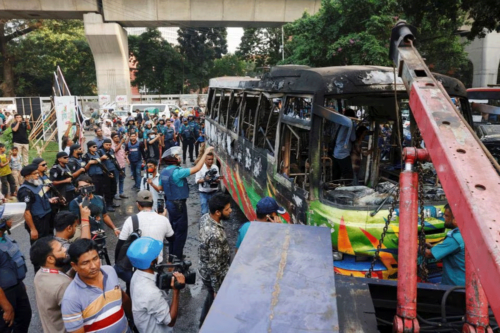 Bus torched as Bangladesh set to declare new minimum wage