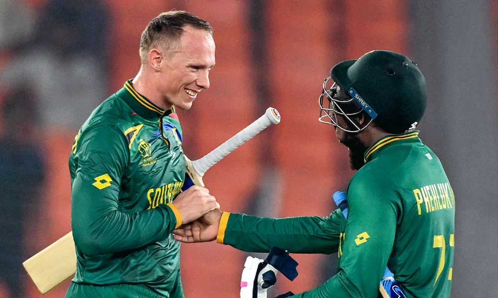 Van der Dussen steers South Africa to victory as Afghanistan exit World Cup
