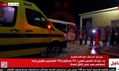 Mixed emotions as first group of Israeli hostages return from Gaza