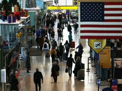 US third-quarter economic growth revised up to 5.2%
