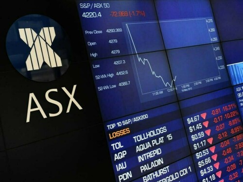 Banks, gold stocks drag Australian shares lower; Santos soars 11% on merger talks