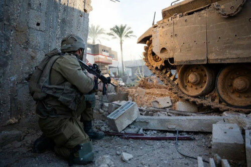 Israel battles Hamas on streets of Gaza city as UN delays vote again