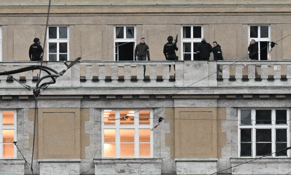 Police seek motive in Prague mass shooting