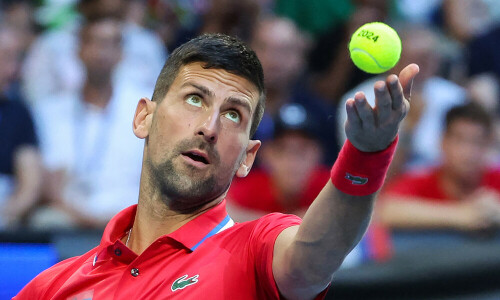 Injury worries for Djokovic, Tsitsipas as Serbia squeeze into quarters