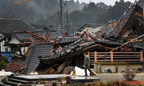 Japan quake toll rises to 64 as weather hampers rescuers