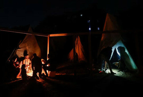 Boy survives Gaza strike that kills family after futile search for tents