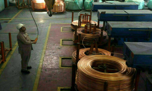 Copper dips on steady dollar ahead of US inflation data