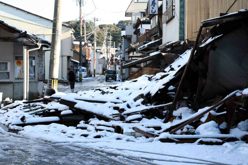 Japan sharply revises down quake missing