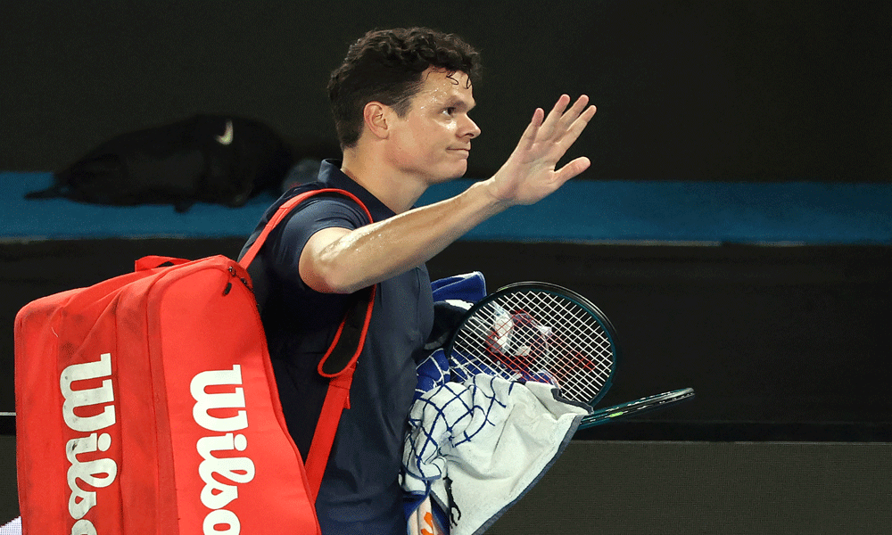 Raonic retires to put De Minaur through at Australian Open