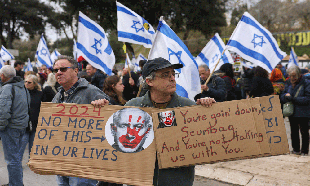 Relatives of Gaza hostages storm Israeli parliament panel as protests mount