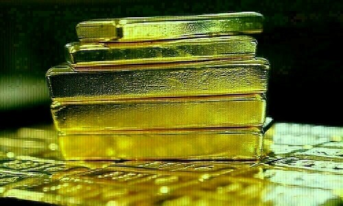 Gold heads for 2nd weekly fall on strong US economy, robust dollar Gold heads for 2nd weekly fall on strong US economy, robust dollar