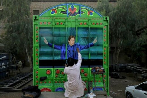 Pakistan election 2024: artwork on trucks dwindles as posters take over