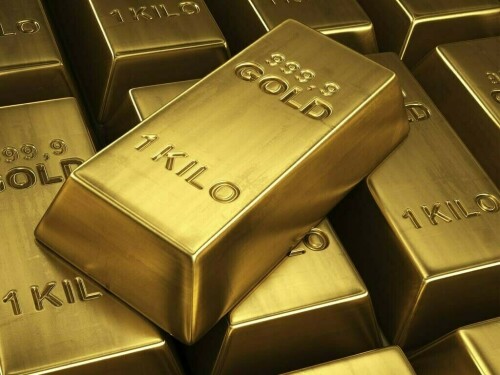 Gold flat as safe-haven demand offsets US dollar strength