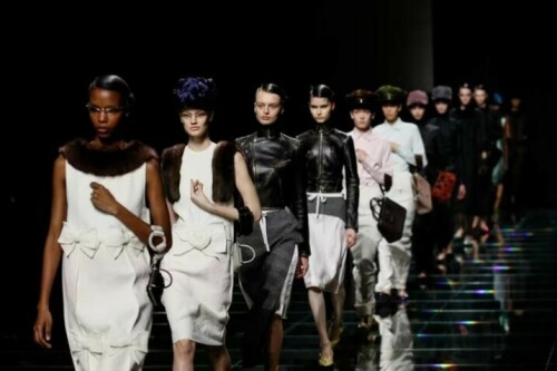 Prada nods to past, snow at Emporio Armani for Milan Fashion Week