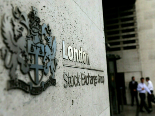 London stocks inch up on earnings bump