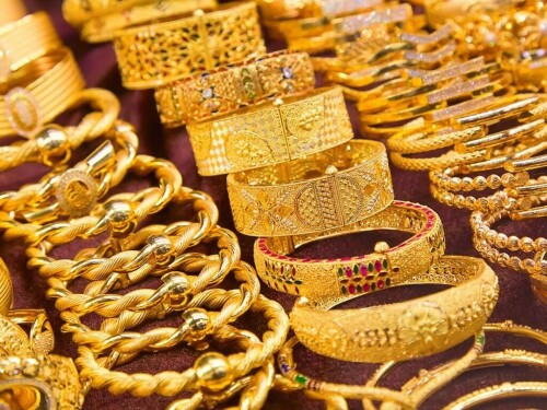 Gold hovers near 3-month peak; focus shifts to Powell testimony
