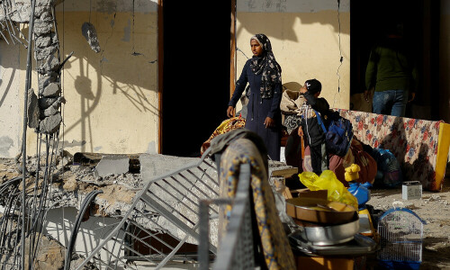 Israel strikes landmark residential tower in southern Rafah as truce talks stall