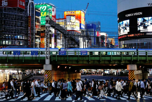 Japan Q4 GDP revised up to slight expansion, economy avoids recession