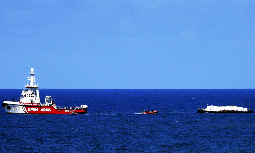 First aid boat unloads in Gaza as Hamas proposes new truce