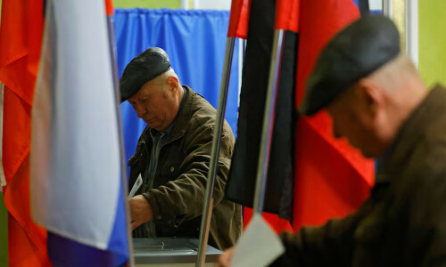 Ukraine attacks Russian city and refinery on second day of presidential election
