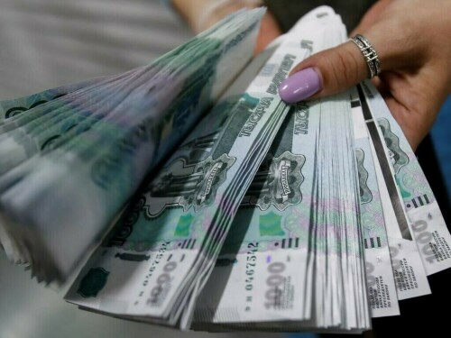 Russian rouble slightly weakens against the US dollar