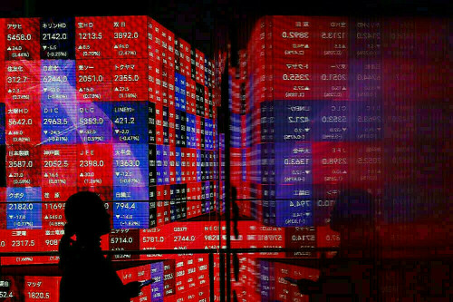 Asian markets mixed after Fed official floats rate cut delay Asian markets mixed after Fed official floats rate cut delay