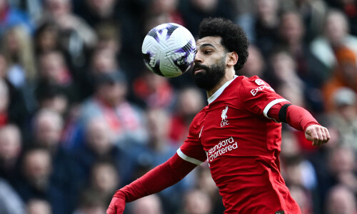 Salah caps fightback as Liverpool go top
