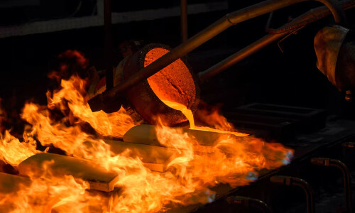 Gold slips from record levels after hot US inflation data