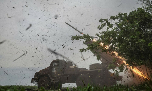 Ukraine, Russia exchange fire, at least seven dead