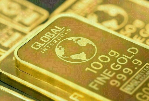 Gold prices flutter higher as Fed holds rates steady