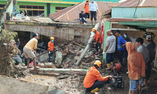 Indonesia floods kill 58 as rescuers race to find missing