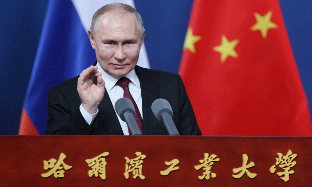 Putin in trade push on final day of China trip