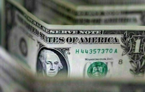Dollar consolidates as Fed urges patience; markets await meeting minutes