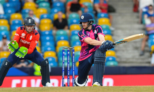 Defending T20 champions England washed out after Scotland scare