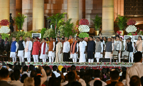 Indian PM unveils coalition cabinet dominated by his party