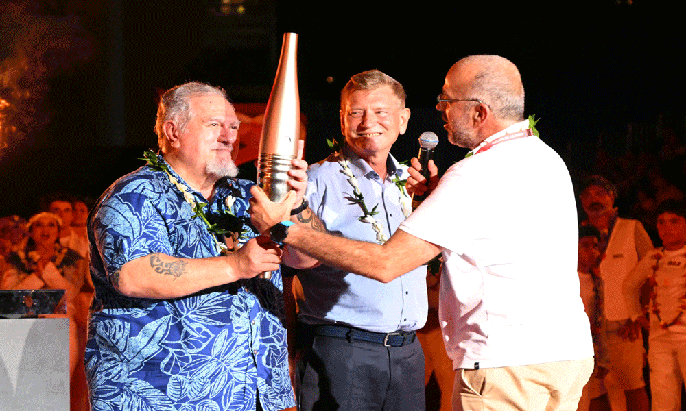 Olympic torch odyssey reaches the surf of Tahiti