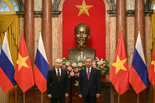 Vladimir Putin in Hanoi after inking North Korea defence pact