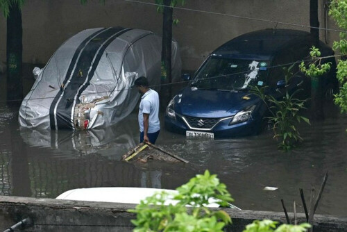 Eleven dead in Indian capital after heavy rain, flight operations stutter