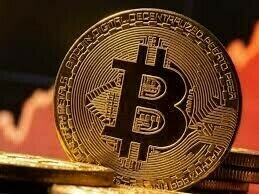 Bitcoin slides to four-month lows, ether sinks 8%