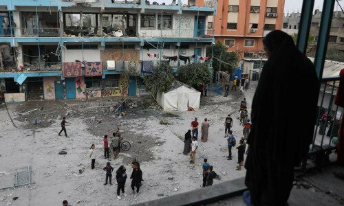 Israeli strikes kill 16 at school housing displaced Gazans, health officials say