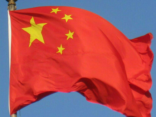 China braces for twin tropical cyclones after deadly flash floods