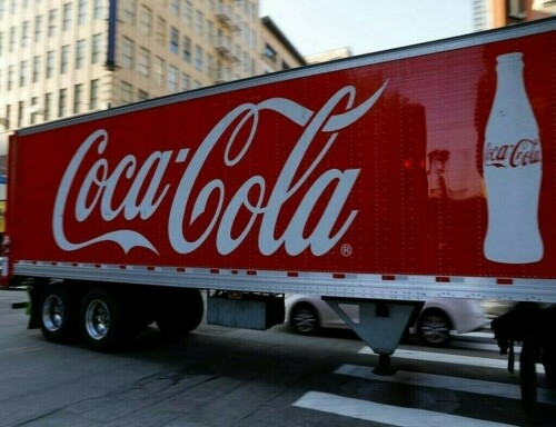 Coca-Cola raises forecasts, bets on price hikes and ad blitz
