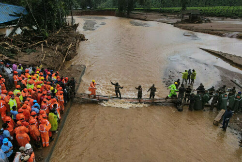 India landslides rescue operations speed up with new metal bridge
