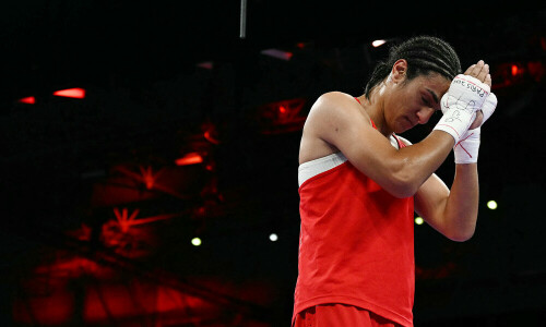 Olympics gender row boxer in tears after winning at least bronze