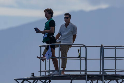 Who is this Aussie bloke at the surfing and where is Colin Jost?