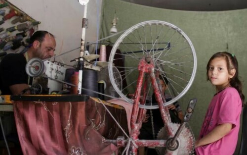 Gazan tailor turns to bicycle to power sewing machine