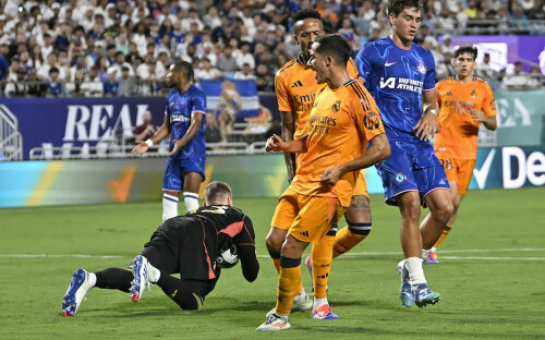 Real Madrid edges Chelsea while AC Milan wins on penalties