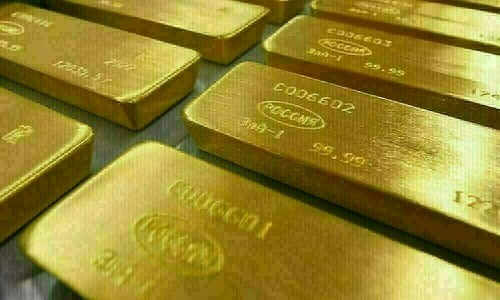 Gold steady near record high as investors seek more Fed cues