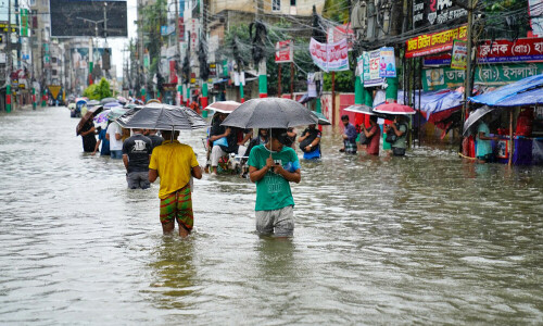 Floods swamp Bangladesh as nation finds its feet after protests